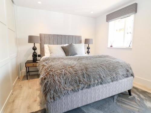 Ένα ή περισσότερα κρεβάτια σε δωμάτιο στο 12 Manor Farm Close