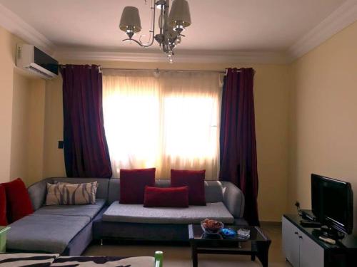 TV a/nebo společenská místnost v ubytování Alexander The Great Hotel