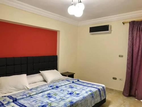 Postel nebo postele na pokoji v ubytování Alexander The Great Hotel