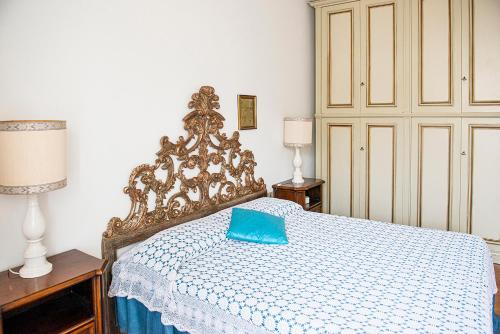 A bed or beds in a room at Appartamento "Casa Mia" Florence