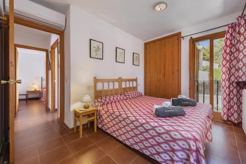 Posteľ alebo postele v izbe v ubytovaní Apartment Bugambilia