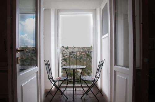 Ein Balkon oder eine Terrasse in der Unterkunft Le Origini