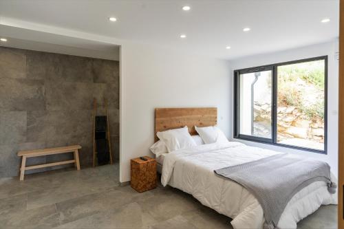 Postel nebo postele na pokoji v ubytování U CAVALLU - Luxe entre Mer et Montagne