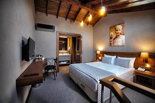 Ένα ή περισσότερα κρεβάτια σε δωμάτιο στο Triada Hotel Büyükada