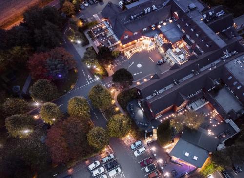 an overhead view of a street at night with lights at Fairlawns, Hotel And Spa in Walsall