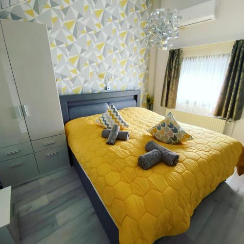 Ένα ή περισσότερα κρεβάτια σε δωμάτιο στο Lacus Pelso Holiday Home