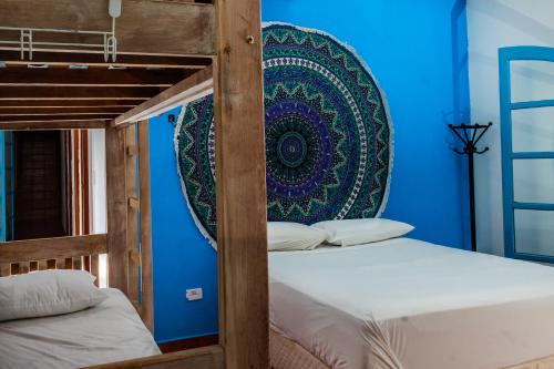 Säng eller sängar i ett rum på Flow Hostel Juquehy