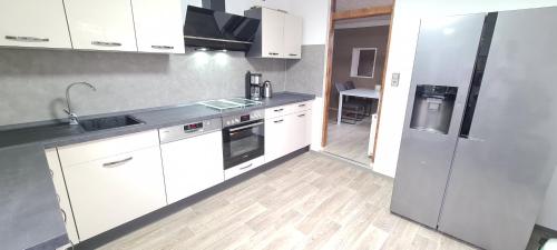 Η κουζίνα ή μικρή κουζίνα στο Ferienhaus Winde 8