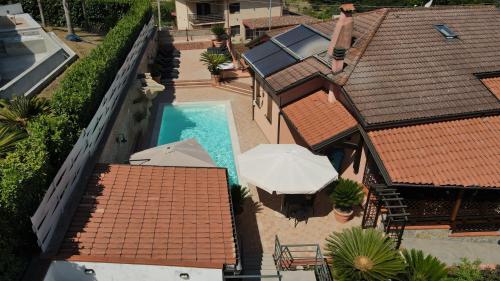 an aerial view of a house with a swimming pool at B&B Villa Maria in Agropoli