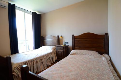 Cama o camas de una habitación en Apartamento BLAU PARK 224