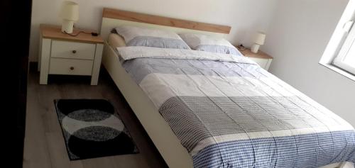 Postel nebo postele na pokoji v ubytování Valbona 1