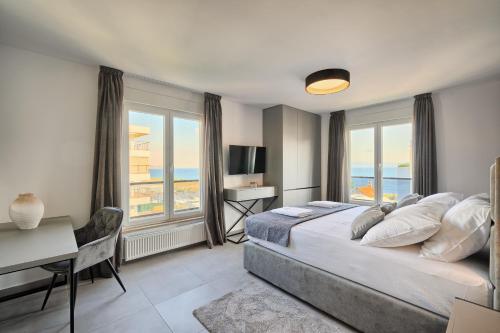 Postel nebo postele na pokoji v ubytování Liberty Living Apartments