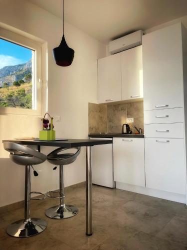 Dapur atau dapur kecil di Almond Apartments
