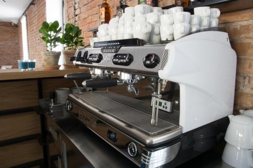 a coffee machine sitting on top of a counter at Hotel Restaurant Na Návsi in Říčany u Brna