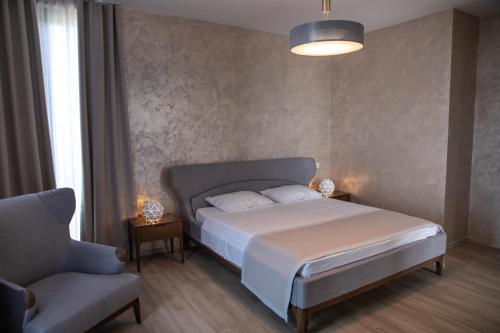 Postel nebo postele na pokoji v ubytování Magnika Resort