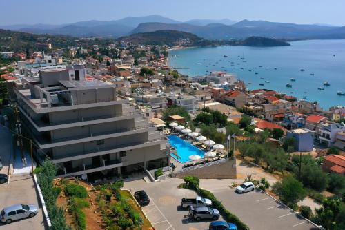 an aerial view of a city with a body of water at King Minos Hotel in Tolo