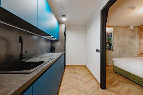 Postel nebo postele na pokoji v ubytování ONE66 Hotel