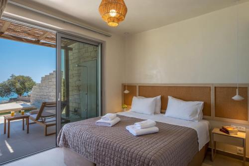 Postel nebo postele na pokoji v ubytování Salvia Luxury Collection Suites