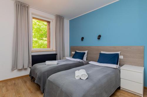 Postel nebo postele na pokoji v ubytování Hostel Szczelinka