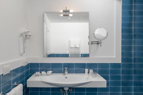 Koupelna v ubytování Grand Hotel Vesuvio