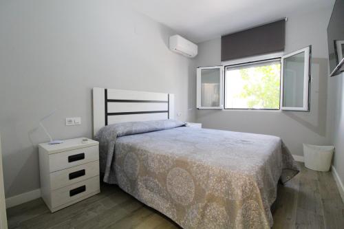 Ein Bett oder Betten in einem Zimmer der Unterkunft Casa sol y playa