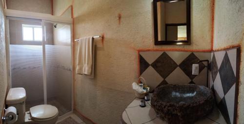 Ванная комната в Hotel Casa del Arbol