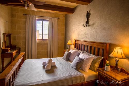 Voodi või voodid majutusasutuse Villa Mandolina toas