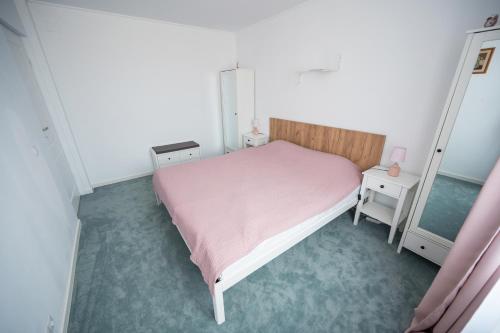 Postel nebo postele na pokoji v ubytování Family Nest Felix