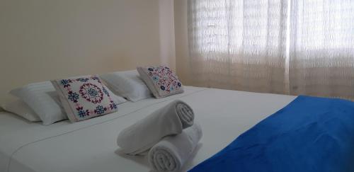 Ένα ή περισσότερα κρεβάτια σε δωμάτιο στο VILA MATILDE NORONHA