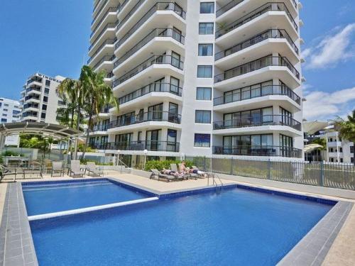 a swimming pool in front of a large building at Stay 4 night Pay 3 nights only, during March 2026 in Mooloolaba