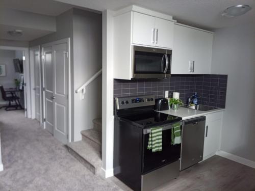 Close to the airport(YYC), Crossiron mall brand new home away from home unit.