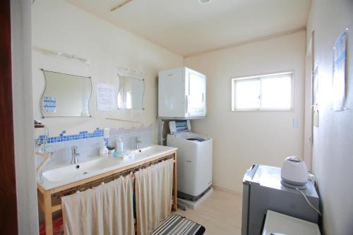 Tanegashima Minshuku Hapisuma tesisinde bir banyo