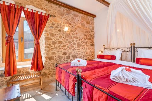 מיטה או מיטות בחדר ב-Cava d'Oro