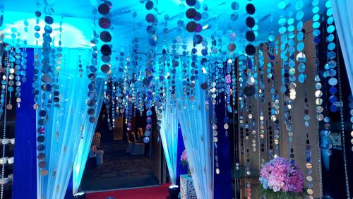 a room filled with blue and silver decorations at Novotel Chennai Sipcot in Chennai