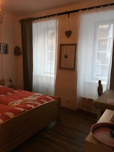 Postel nebo postele na pokoji v ubytování U Parku
