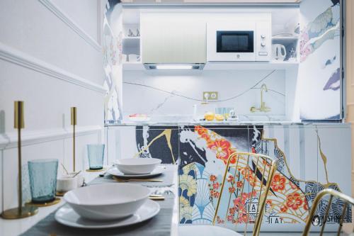 Posezení v ubytování Suite Kintsugi by Justine Apartments Apartamento turístico en Madrid Río