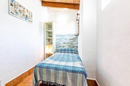 Un pat sau paturi într-o cameră la Villa Mosteiro, 'The Cosy Corner'