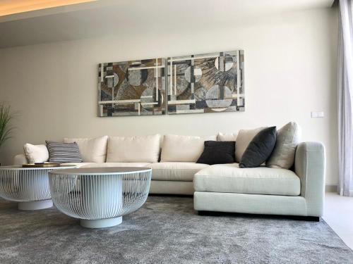 a living room with a couch and a coffee table at Darya Estepona in Estepona