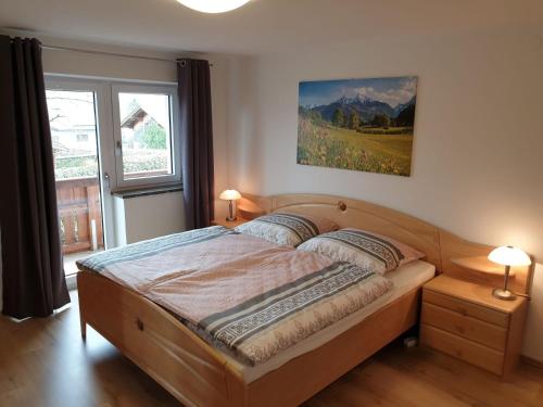 Säng eller sängar i ett rum på Wastlhof