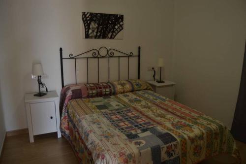 Ein Bett oder Betten in einem Zimmer der Unterkunft CASA NORI - Apartamento a 4 minutos de la playa