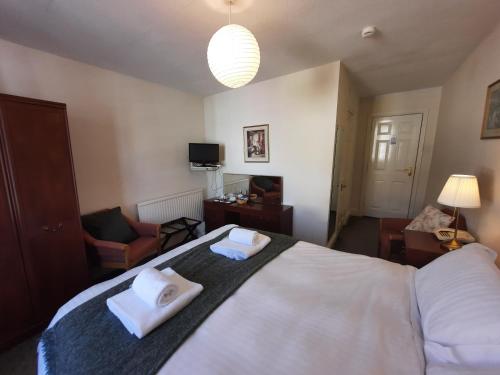 Ένα ή περισσότερα κρεβάτια σε δωμάτιο στο Lion Hotel Dulverton
