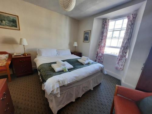 Ένα ή περισσότερα κρεβάτια σε δωμάτιο στο Lion Hotel Dulverton