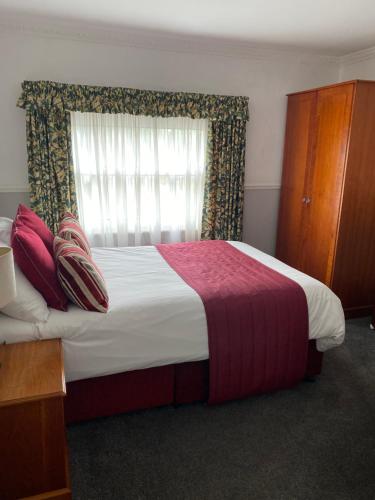 A bed or beds in a room at The Peel Aldergate 