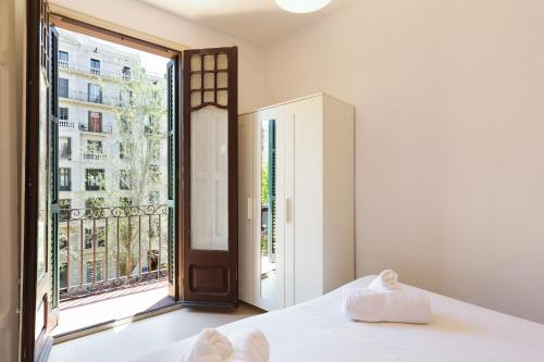 A bed or beds in a room at Stay U-nique Apartments Mistral
