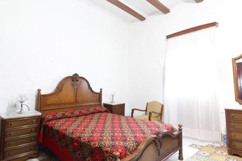 Cama ou camas em um quarto em Global Properties, Casa rural en Quartell con encanto