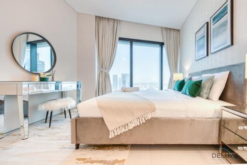 Postel nebo postele na pokoji v ubytování Captivating 1BR at The Address Residences in JBR by Deluxe Holiday Homes