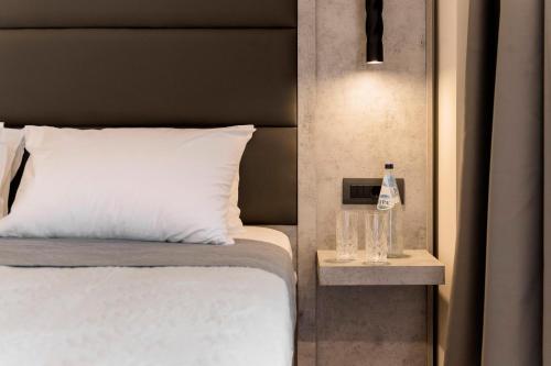 Katil atau katil-katil dalam bilik di Megusta Suites
