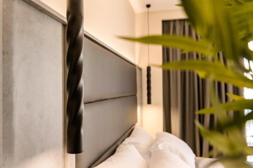 Katil atau katil-katil dalam bilik di Megusta Suites