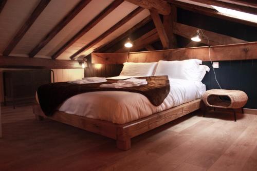 Säng eller sängar i ett rum på Kapera Maison d'Hotes