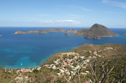 an aerial view of the islands in the ocean at TI COCO in Terre-de-Bas